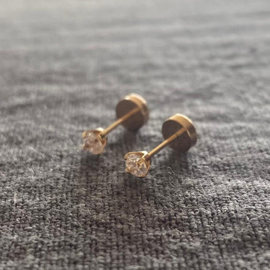 Abridores de oro  18 kilates con circón de 3 mm con tuerca tope a presión