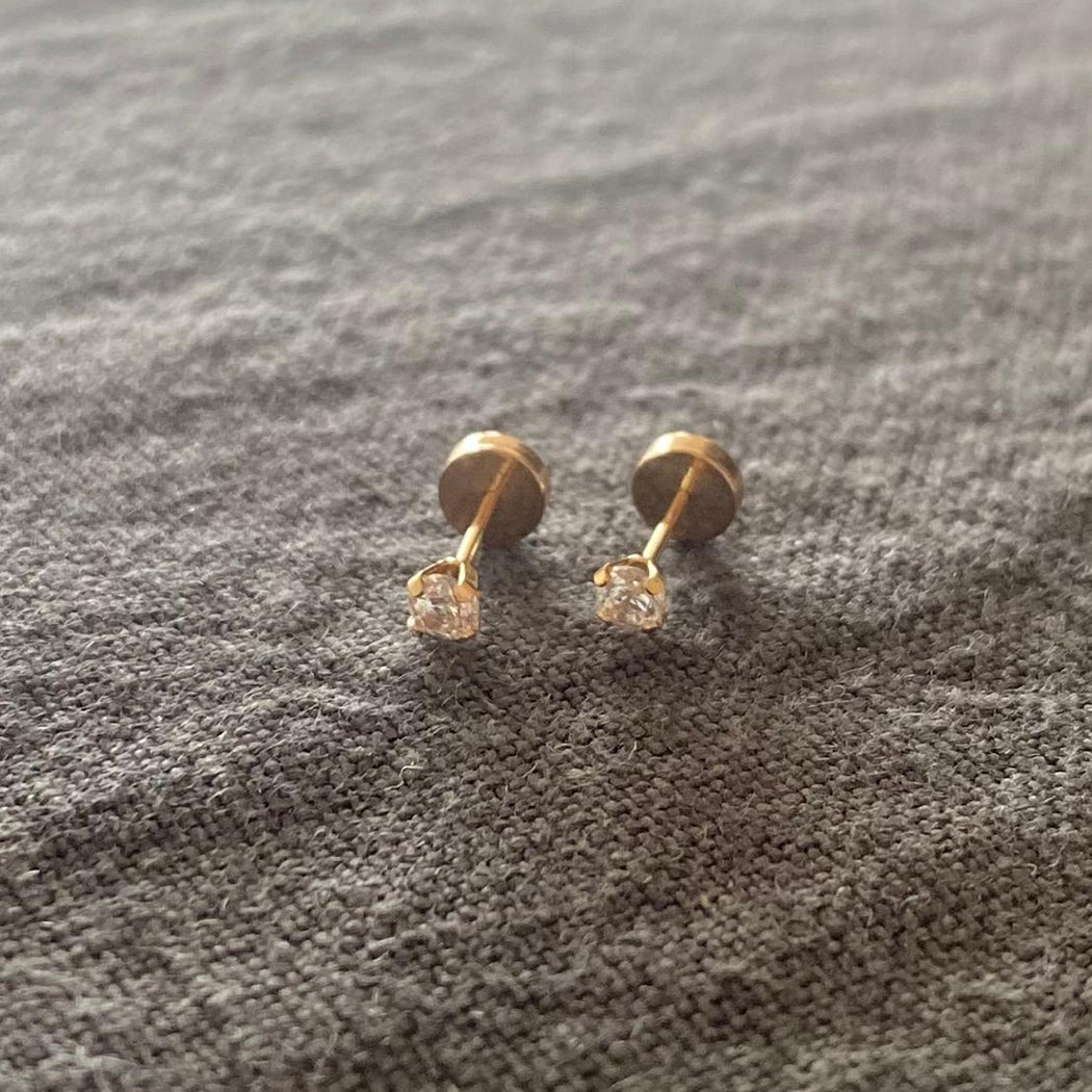 Abridores de oro  18 kilates con circón de 3 mm con tuerca tope a presión