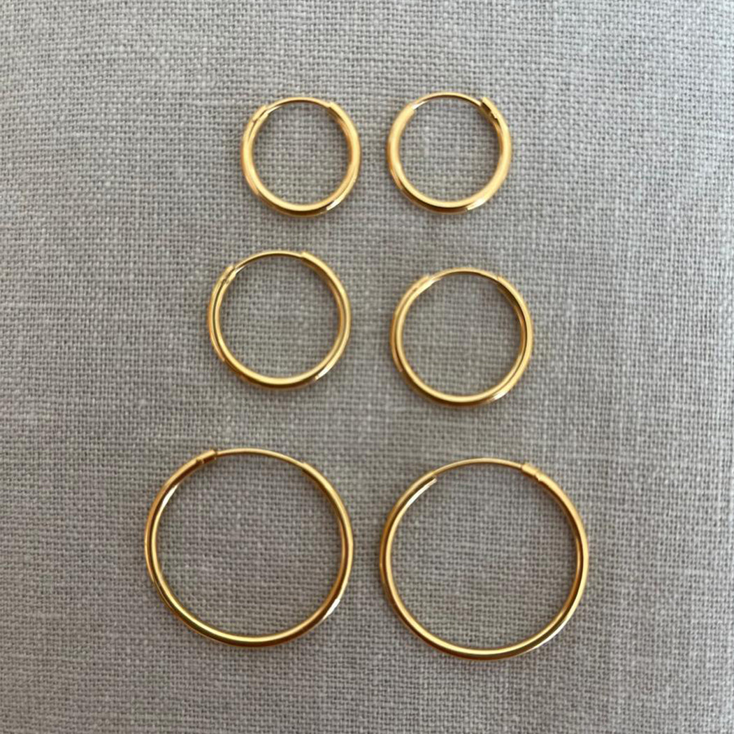 Argolla tubo redondo 24mm oro 18 kilates (Copia)
